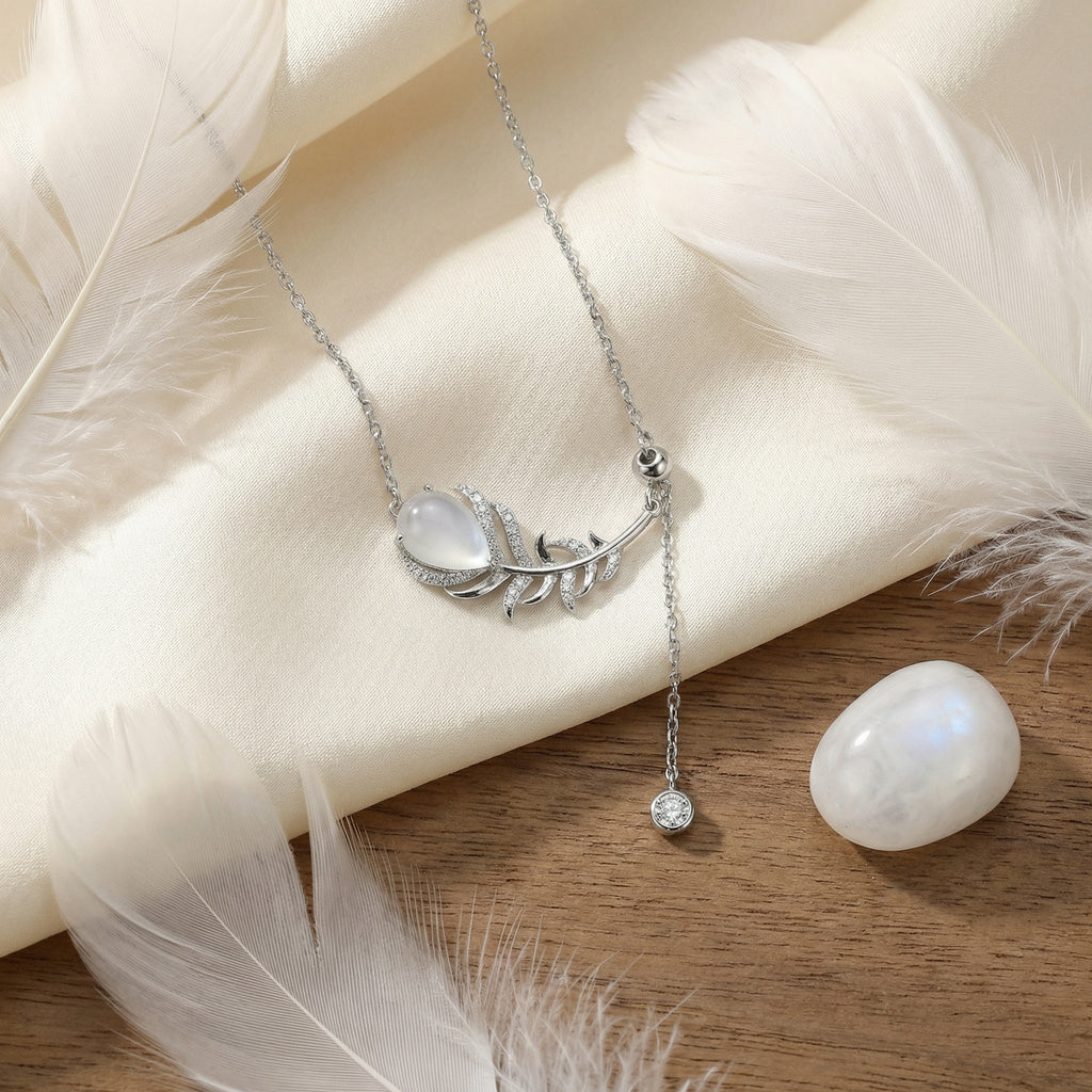 925 Sterling Silver Elegant Sterling Silver Feather Pendant Necklace with Pear Moonstone and Sparkling Accents