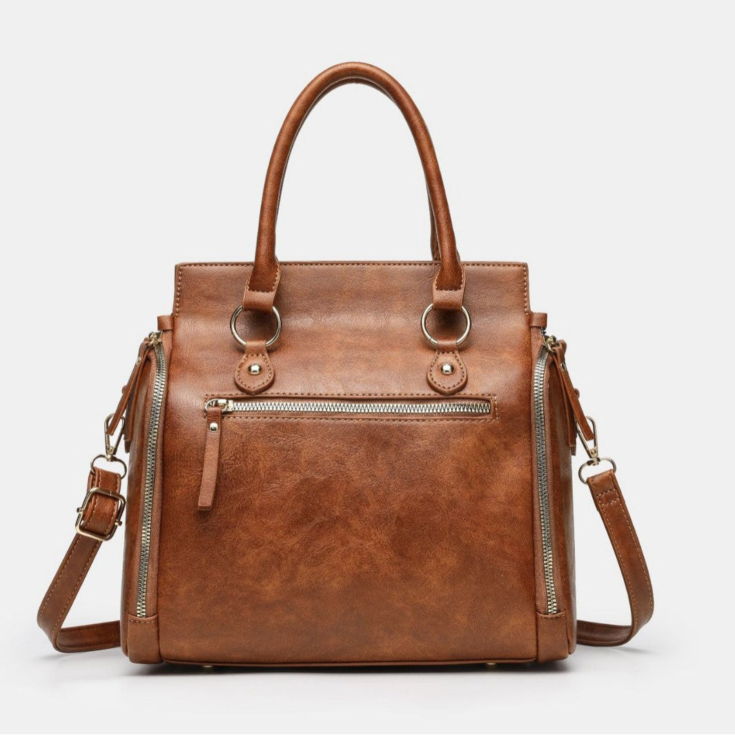 Tote Bag With A Multi-functional, Detachable Shoulder Strap For Handheld Use