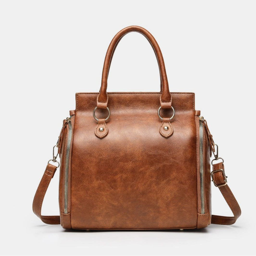 Tote Bag With A Multi-functional, Detachable Shoulder Strap For Handheld Use